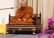 Memberikan Persembahan kepada Sangha dan Memuja Tapak Kaki Sang Buddha